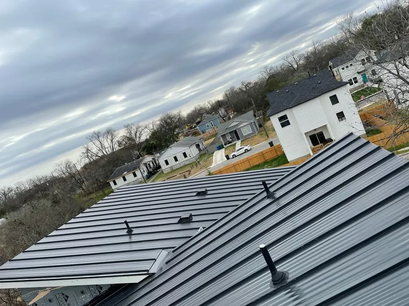 Standing seam metal roof panels with vents for Skylight Repair in Portales